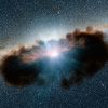 Dusty doughnut around massive black hole spied for first time