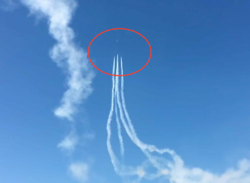 Is this a UFO breaking away from Blue Angels?